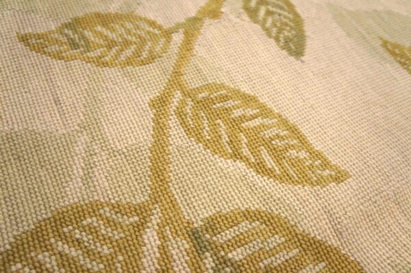 Contemporary handwoven wool needlepoint rug â€” ivory ground, glamorous branches - detail view 5