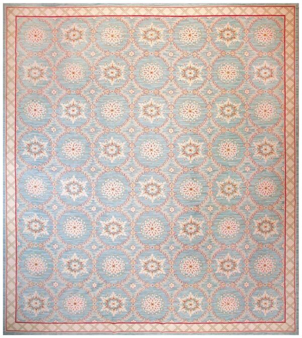 Contemporary handwoven wool needlepoint rug â€” light blue color