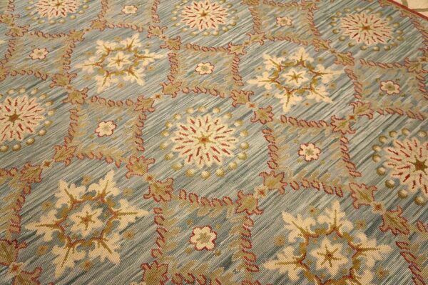 Contemporary handwoven wool needlepoint rug â€” light blue color - detail view 9