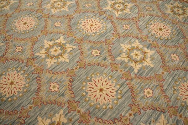 Contemporary handwoven wool needlepoint rug â€” light blue color - detail view 4
