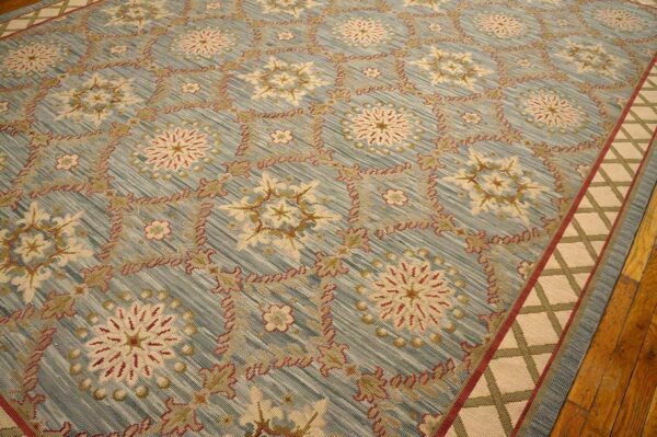 Contemporary handwoven wool needlepoint rug â€” light blue color - detail view 6