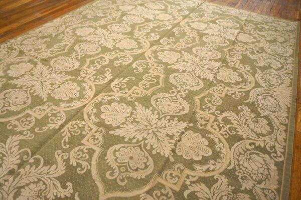 Contemporary handwoven wool needlepoint rug â€” olive green ground - detail view 4