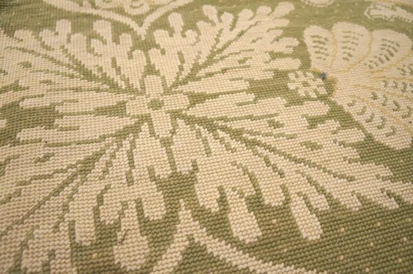 Contemporary handwoven wool needlepoint rug â€” olive green ground - detail view 7