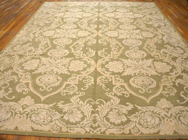 Contemporary handwoven wool needlepoint rug â€” olive ground, allover pattern - detail view 1