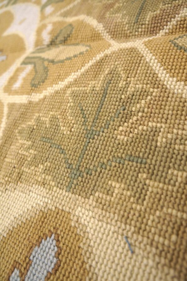 Contemporary handwoven wool needlepoint rug — refined composition with silk highlights - detail view 7