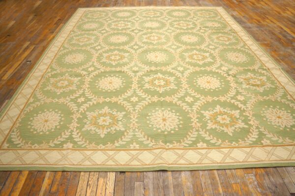 Contemporary handwoven wool needlepoint rug — six-star motif - detail view 1