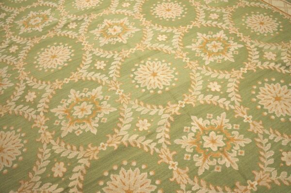 Contemporary handwoven wool needlepoint rug — six-star motif - detail view 2