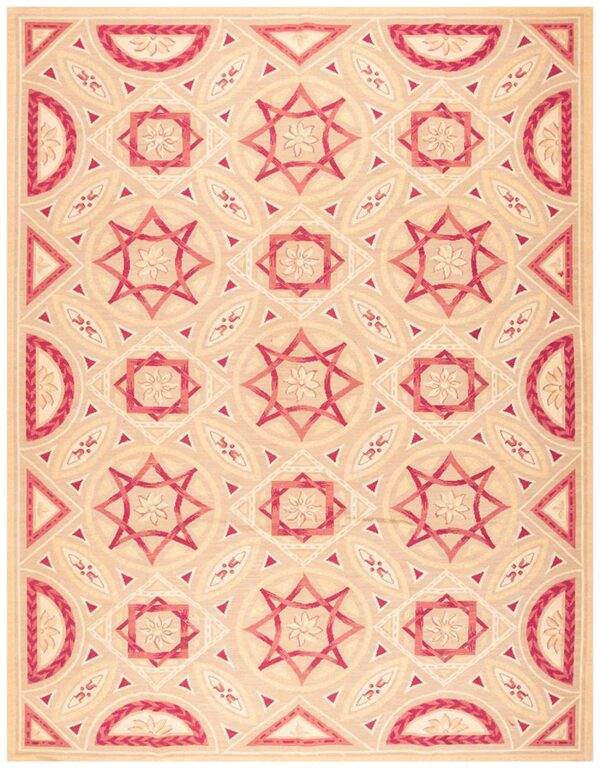 Contemporary handwoven wool needlepoint rug â€” striking geometric composition