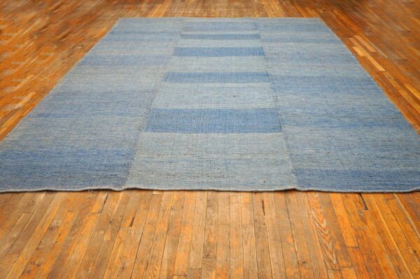 Contemporary shaker style flat-weave rug â€” faded blue color - detail view 1