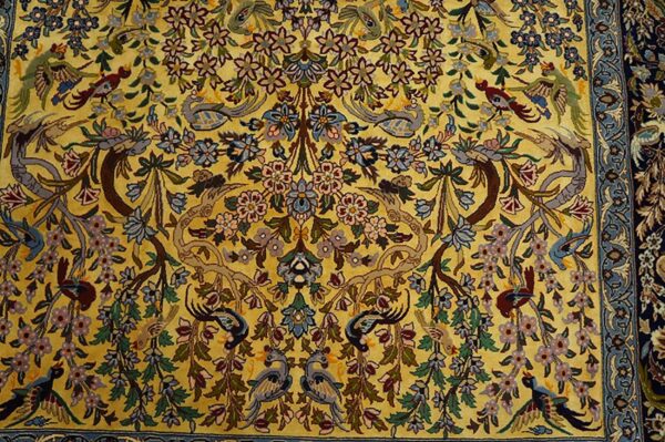 Mid 20th century persian isfahan carpet 4'7"ã—7'1" yellow & dark blue, wool & silk, circa 1940 - detail view 2