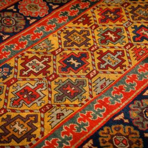 1880s Yellow Antique Geometric Tribal Knotted Wool Caucasian Tallish Runner Rug - detail view 1