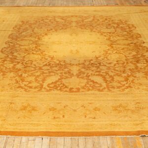 1890s Antique Gold Open Field Medallion Knotted Wool Indian Agra Decorative Rug - detail view 1
