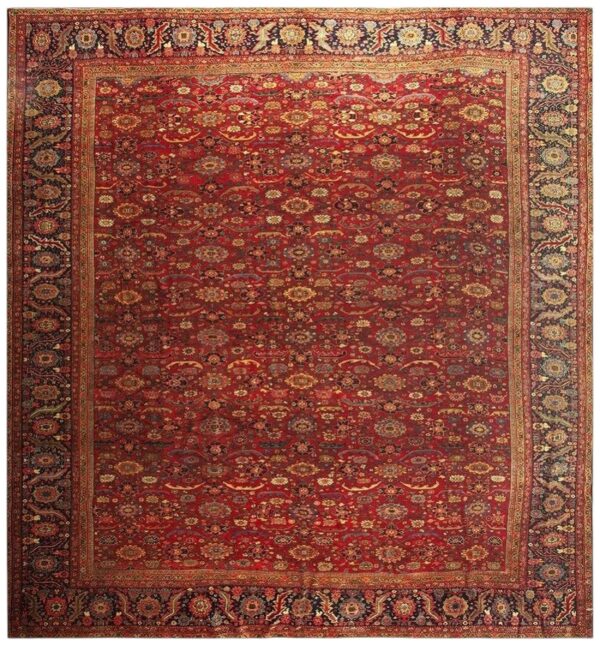 1890s antique red ground overscale botanical handknotted wool sultanabad rug