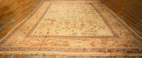 1890s green grand scale botanical motifs knotted wool antique oushak turkish rug 2 1890s green grand scale botanical motifs knotted wool antique oushak turkish rug - detail view 1