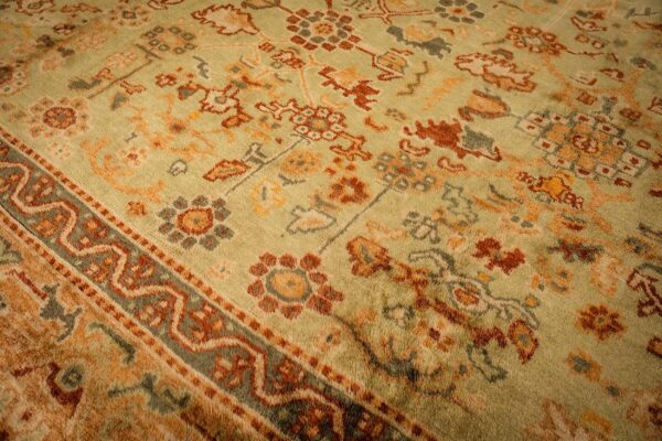 1890s green grand scale botanical motifs knotted wool antique oushak turkish rug 6 1890s green grand scale botanical motifs knotted wool antique oushak turkish rug - detail view 5
