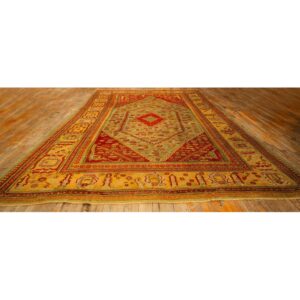 1890s Red Field Medallion Knotted Wool Antique Oushak Turkish Decorative Rug - detail view 1