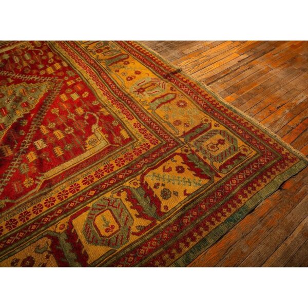 1890s red field medallion knotted wool antique oushak turkish decorative rug - detail view 4