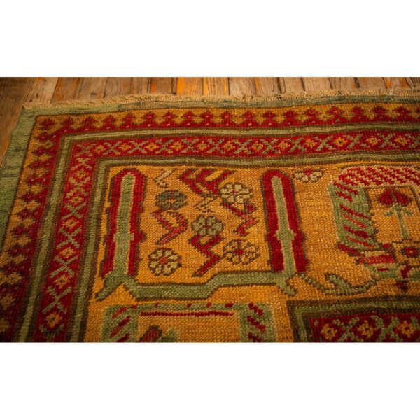 1890s red field medallion knotted wool antique oushak turkish decorative rug - detail view 5