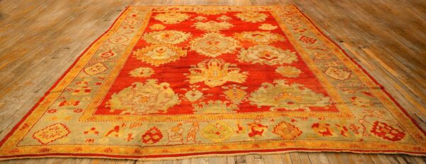1890s red ground geometric knotted wool antique oushak turkish decorative rug 2 1890s red ground geometric knotted wool antique oushak turkish decorative rug - detail view 1