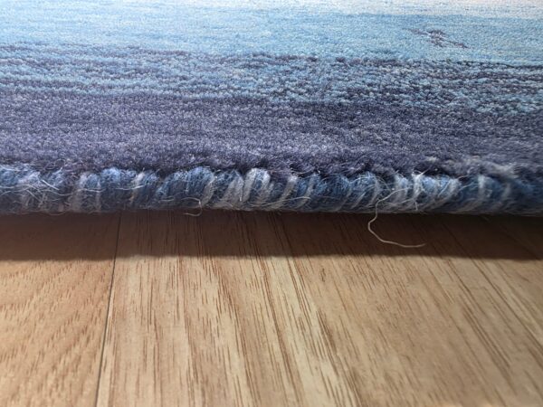 Handloomed blue gabbeh tribal wool area rug - image 10