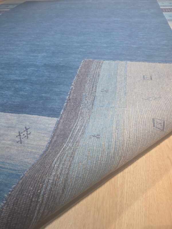 Handloomed blue gabbeh tribal wool area rug - image 11