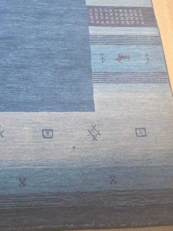 Handloomed blue gabbeh tribal wool area rug - image 16