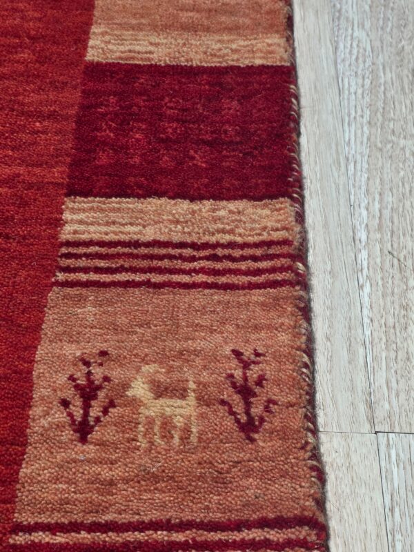 Handloomed red gabbeh tribal wool area rug - image 3