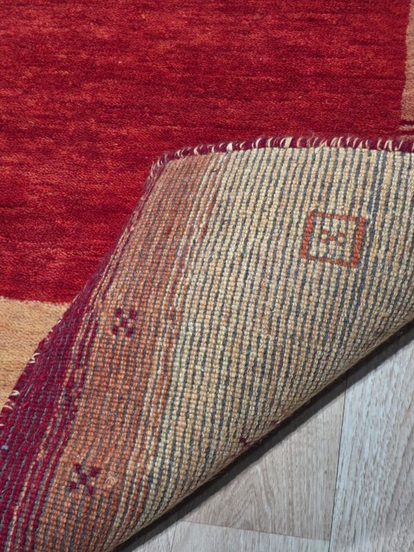 Handloomed red gabbeh tribal wool area rug - image 6