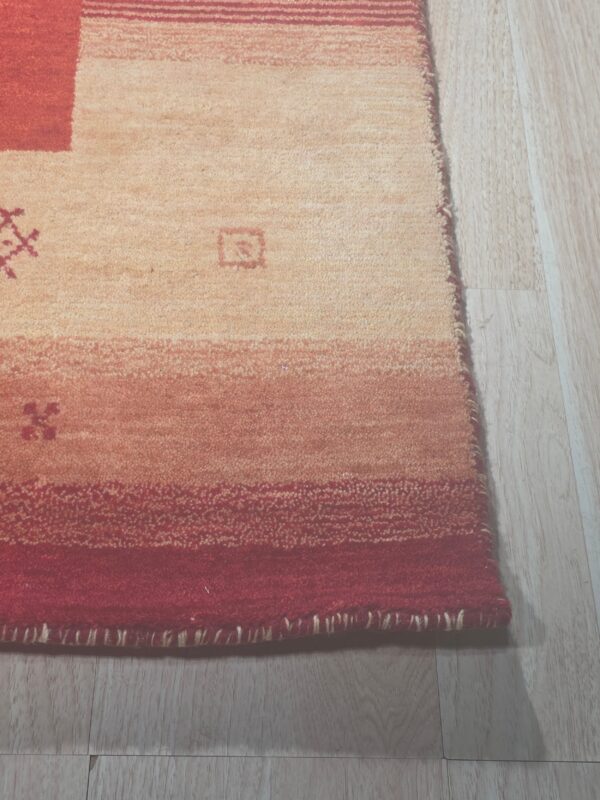 Handloomed red gabbeh tribal wool area rug - image 10