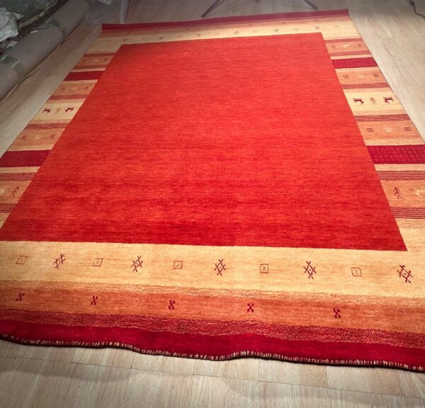 Handloomed red gabbeh tribal wool area rug - image 12