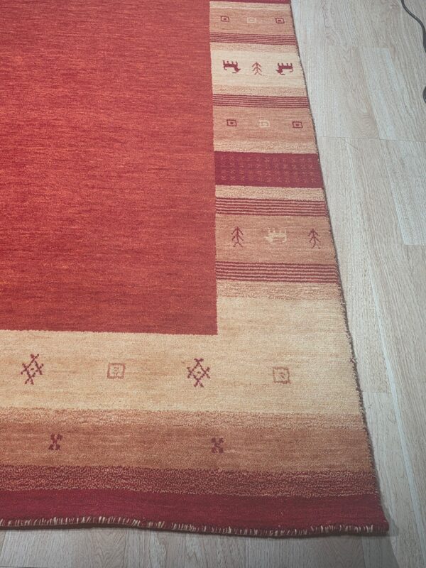 Handloomed red gabbeh tribal wool area rug - image 13
