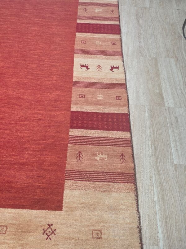 Handloomed red gabbeh tribal wool area rug - image 14