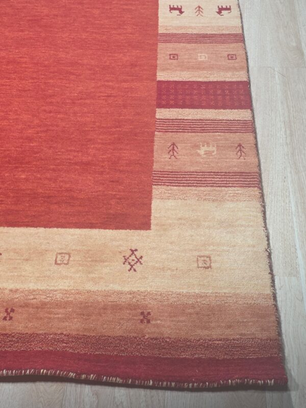 Handloomed red gabbeh tribal wool area rug - image 15