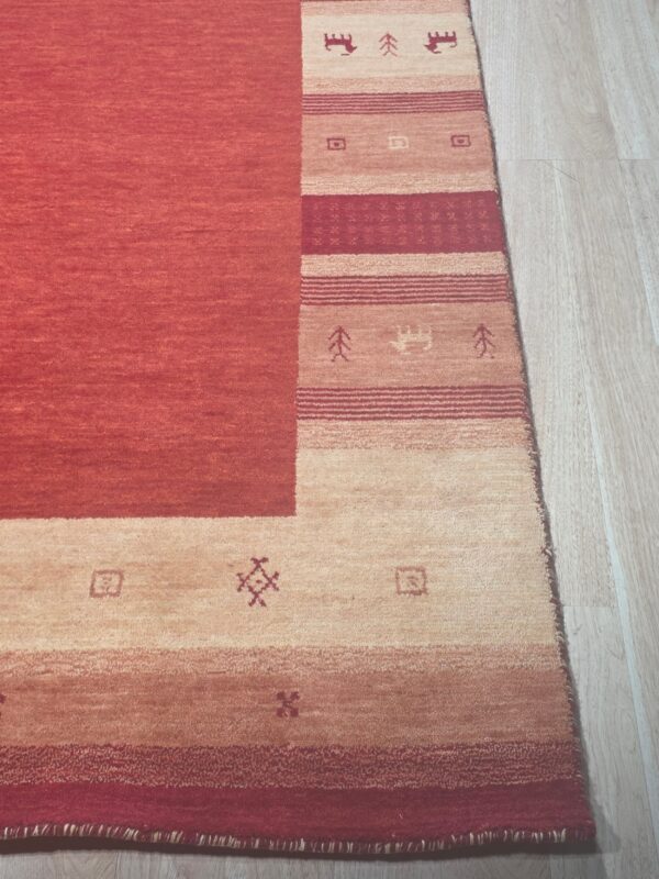 Handloomed red gabbeh tribal wool area rug - image 16