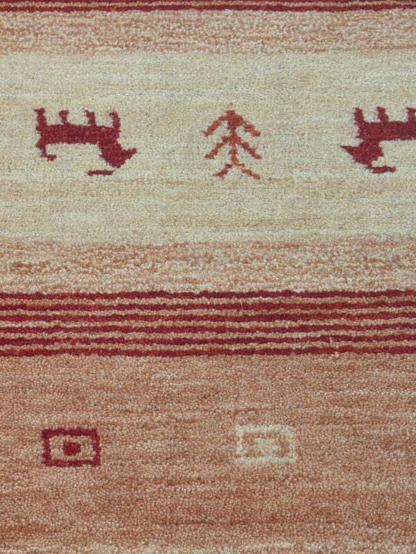 Handloomed red gabbeh tribal wool area rug - image 17