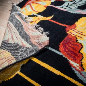 Black floral contemporary rug back corner detail