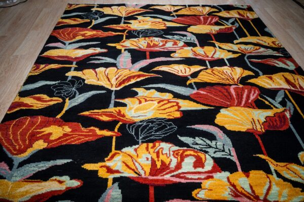 Black floral contemporary rug field detail with bold blossoms