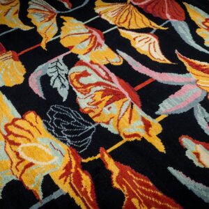 Black floral contemporary rug angled field detail