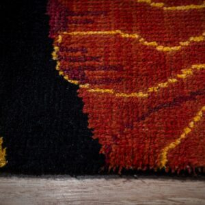 Black floral contemporary rug pile texture close-up