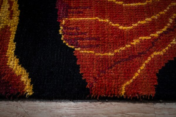 Black floral contemporary rug pile texture close-up