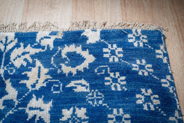 Blue ivory oushak rug hand-knotted back and fringe detail