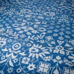 Blue ivory Oushak rug angled field detail