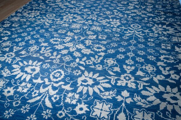 Blue ivory oushak rug angled field detail