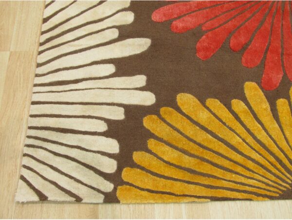 Brown transitional floral rug corner and bloom detail