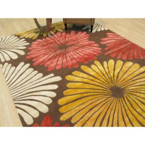 Brown transitional floral rug styled in a living room