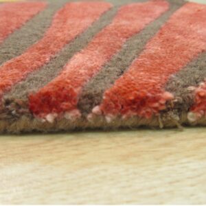 Brown transitional floral rug hand-tufted pile texture close-up