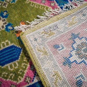 Green and fuchsia Kazak rug hand-knotted back and pile detail