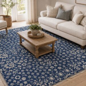 Blue ivory Oushak floral rug styled in a cozy living room