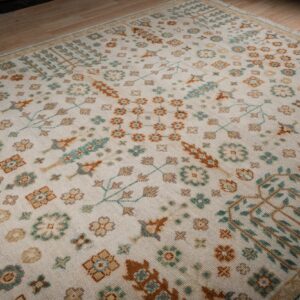 Ivory Oushak rug angled allover field detail