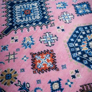 Pink ivory Kazak rug top-down field detail